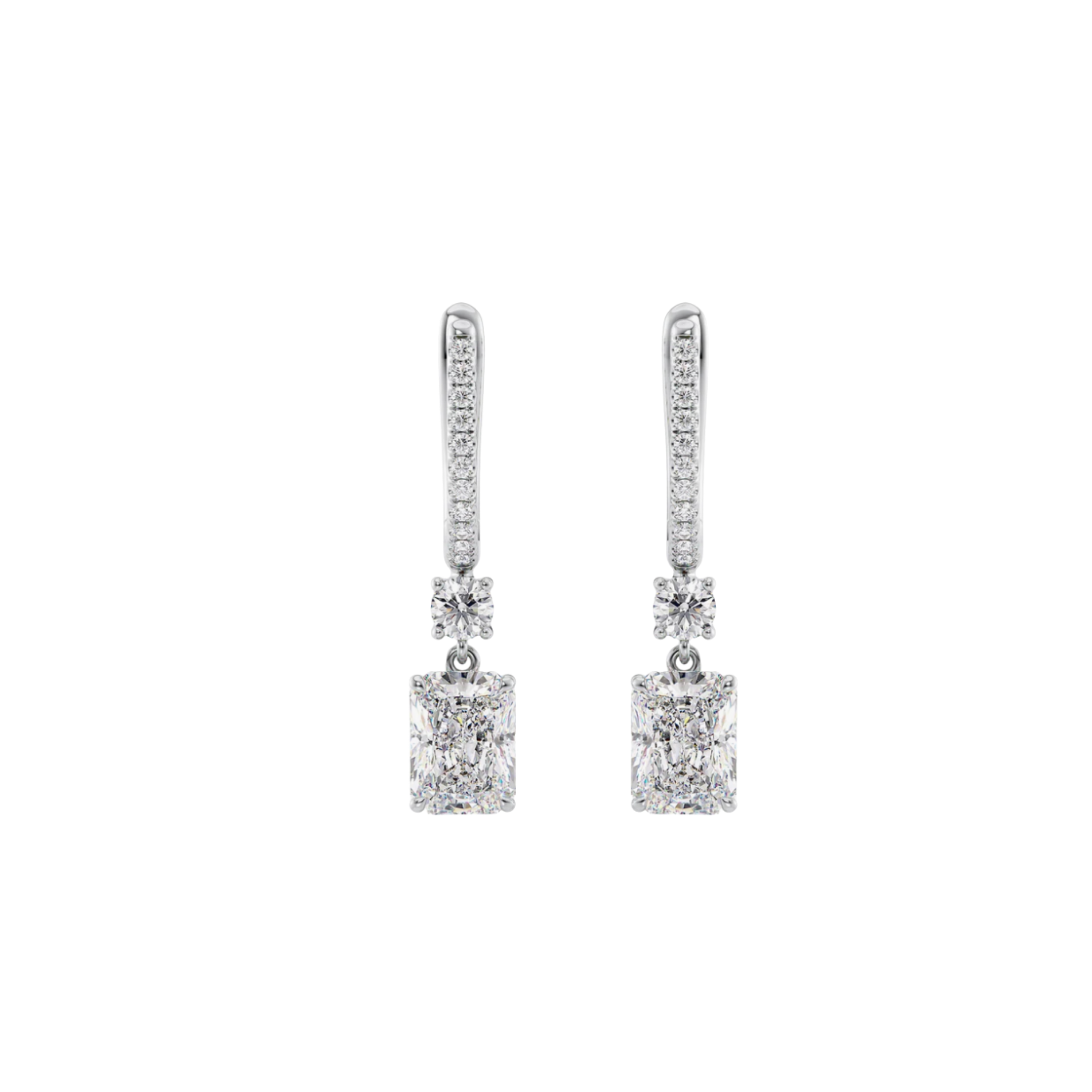 Celestia Radiant-Cut Diamond Drop Earrings 18K White Gold - Natural Diamonds & Lab Grown Diamonds - Best prices for jewelry and diamonds. The best jewelry to shop in Dubai and Abu Dhabi - Dubai Tourism. Best Shopping in Dubai Mall - Fashion Avenue, Mall of Emirates, Dubai, Palm Jumeirah and UAE. Hip-hop custom jewelry and manufacturer supplier - diamond and gold wholesaler. The best place to visit in Dubai during vacation. Richie Gold & Diamond is located in Dubai Gold Souk