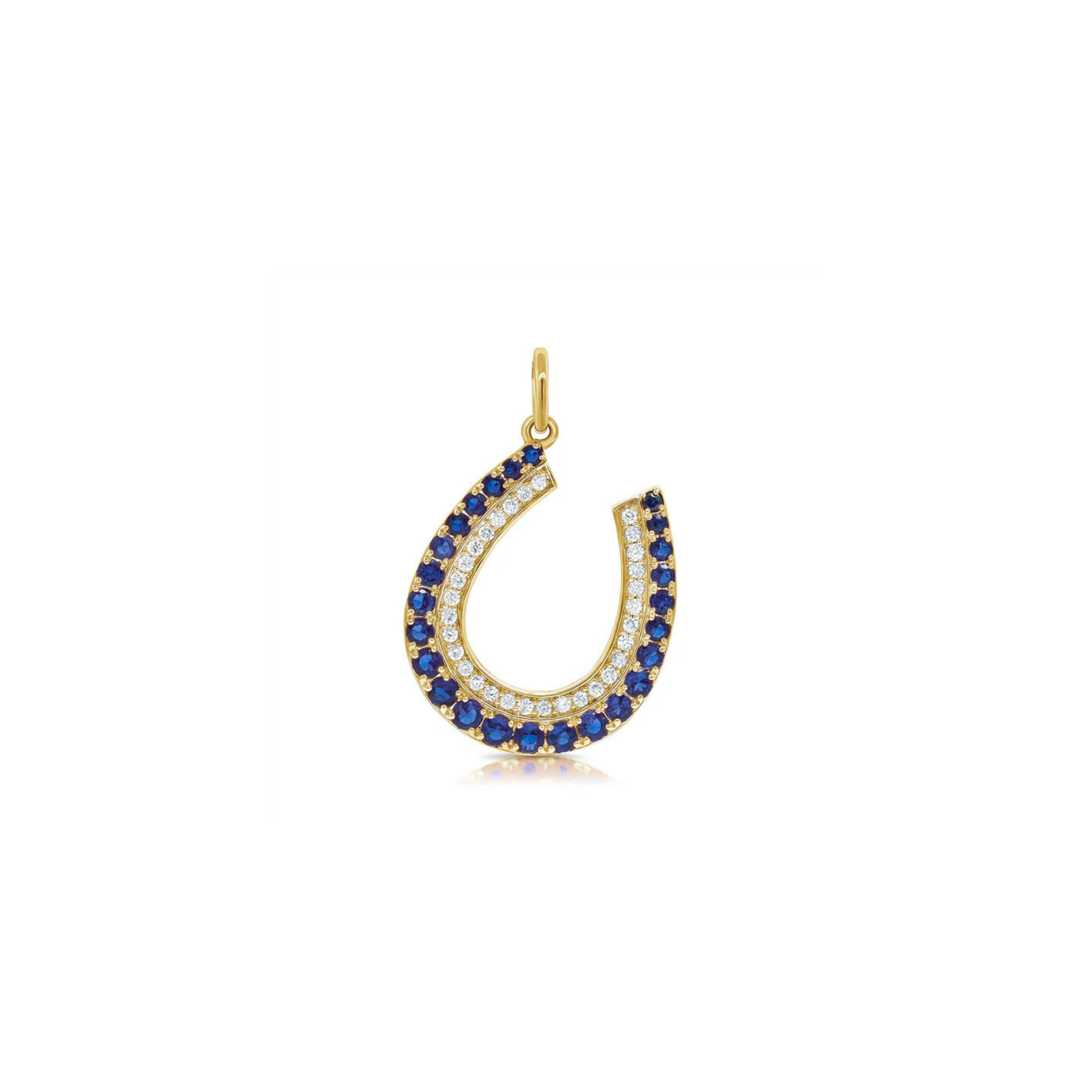 Iselda Diamond & Blue Sapphire Horseshoe Charm 18K Gold - Natural Diamonds & Lab Grown Diamonds  - Best prices for jewelry and diamonds. The best jewelry to shop in Dubai and Abu Dhabi - Dubai Tourism. Best Shopping in Dubai Mall - Fashion Avenue, Mall of Emirates, Dubai, Palm Jumeirah and UAE. Hip-hop custom jewelry and manufacturer supplier - diamond and gold wholesaler. The best place to visit in Dubai during vacation. Richie Gold & Diamond is located in Dubai Gold Souk