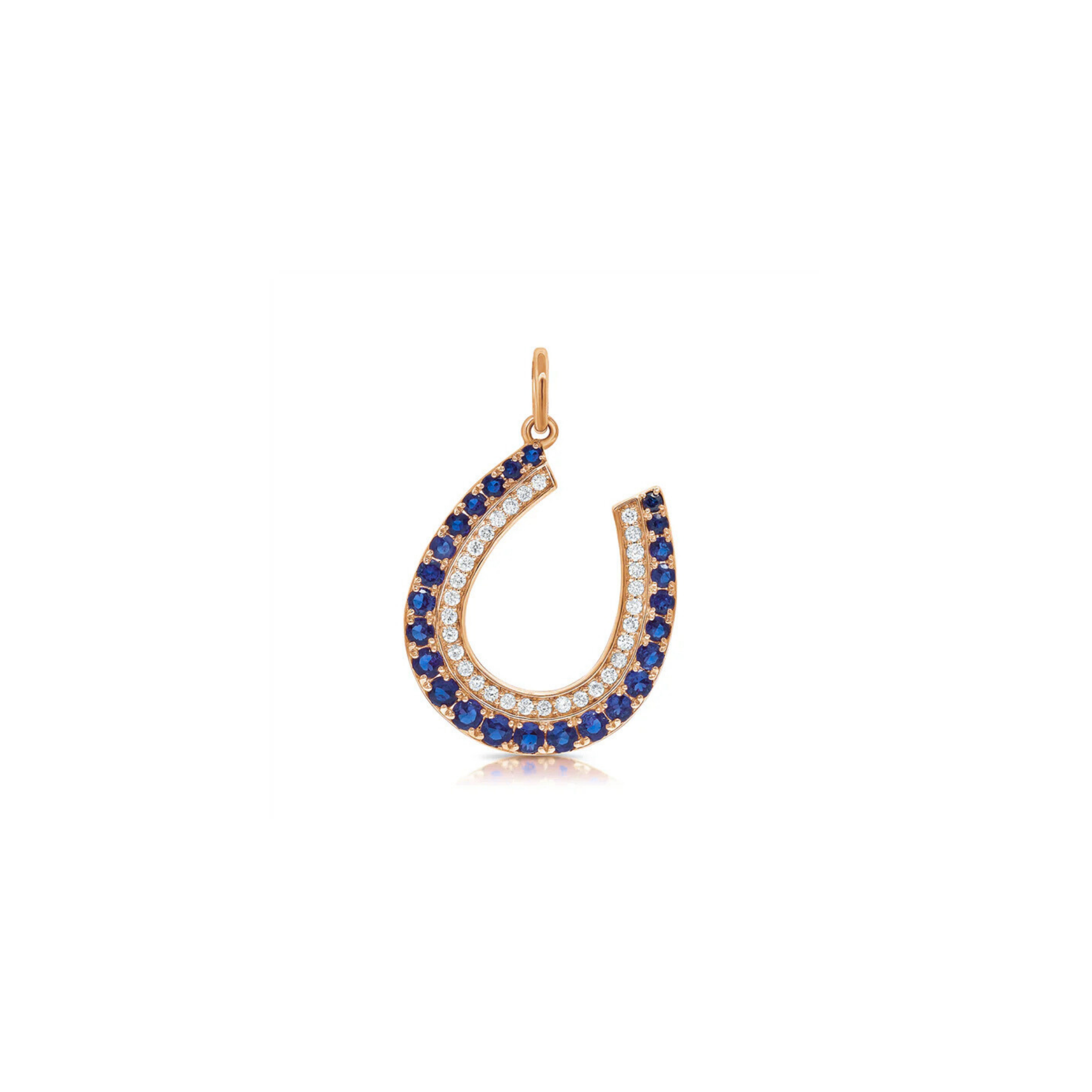 Iselda Diamond & Blue Sapphire Horseshoe Charm 18K Rose Gold - Natural Diamonds & Lab Grown Diamonds  - Best prices for jewelry and diamonds. The best jewelry to shop in Dubai and Abu Dhabi - Dubai Tourism. Best Shopping in Dubai Mall - Fashion Avenue, Mall of Emirates, Dubai, Palm Jumeirah and UAE. Hip-hop custom jewelry and manufacturer supplier - diamond and gold wholesaler. The best place to visit in Dubai during vacation. Richie Gold & Diamond is located in Dubai Gold Souk